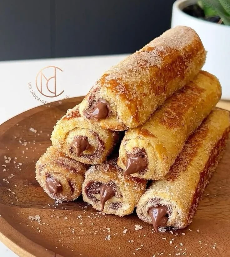 Deliciously rolled French toast filled with sweet cream and toasted to perfection.